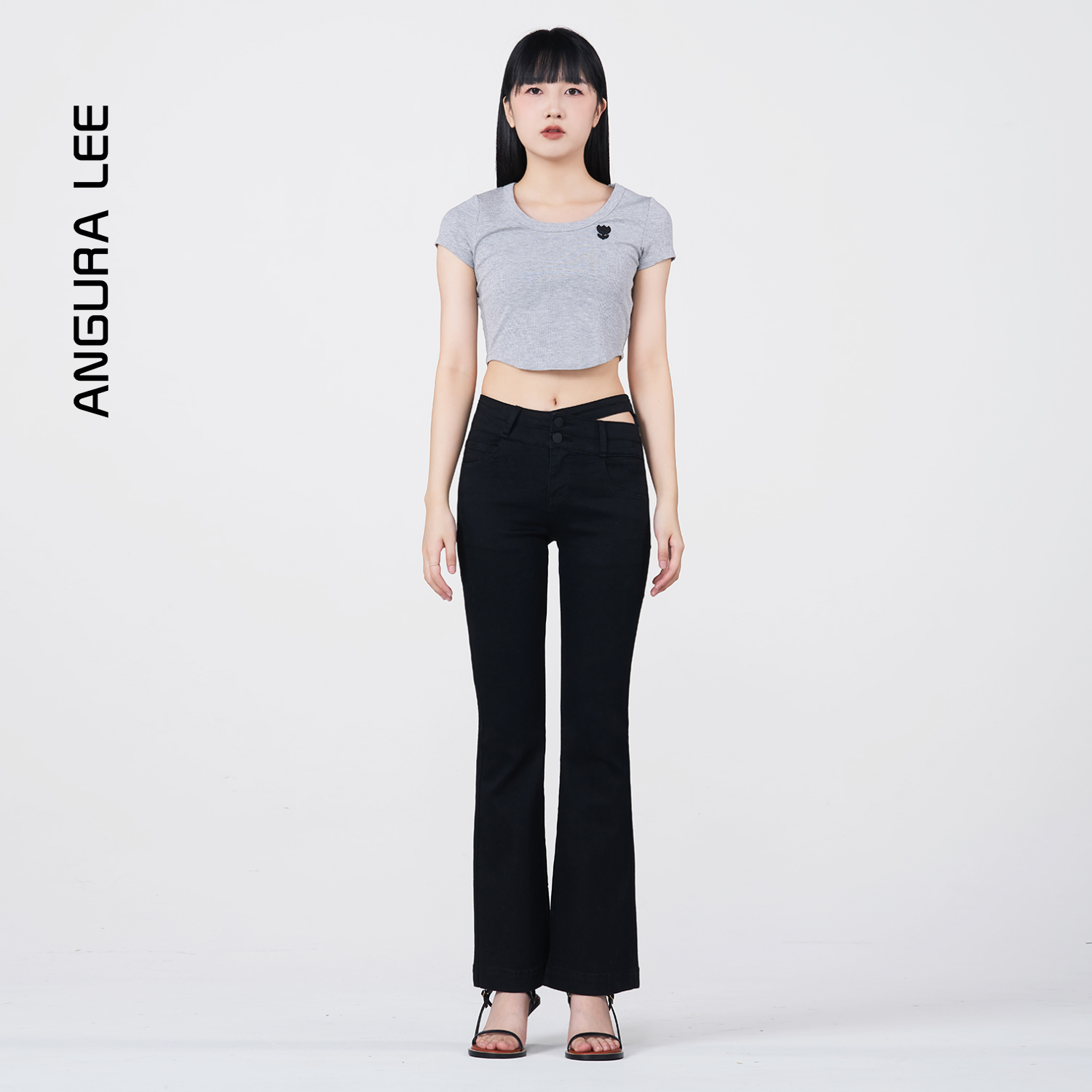 春夏新款經(jīng)典水洗黑色女裝高腰鏤空開(kāi)叉喇叭褲